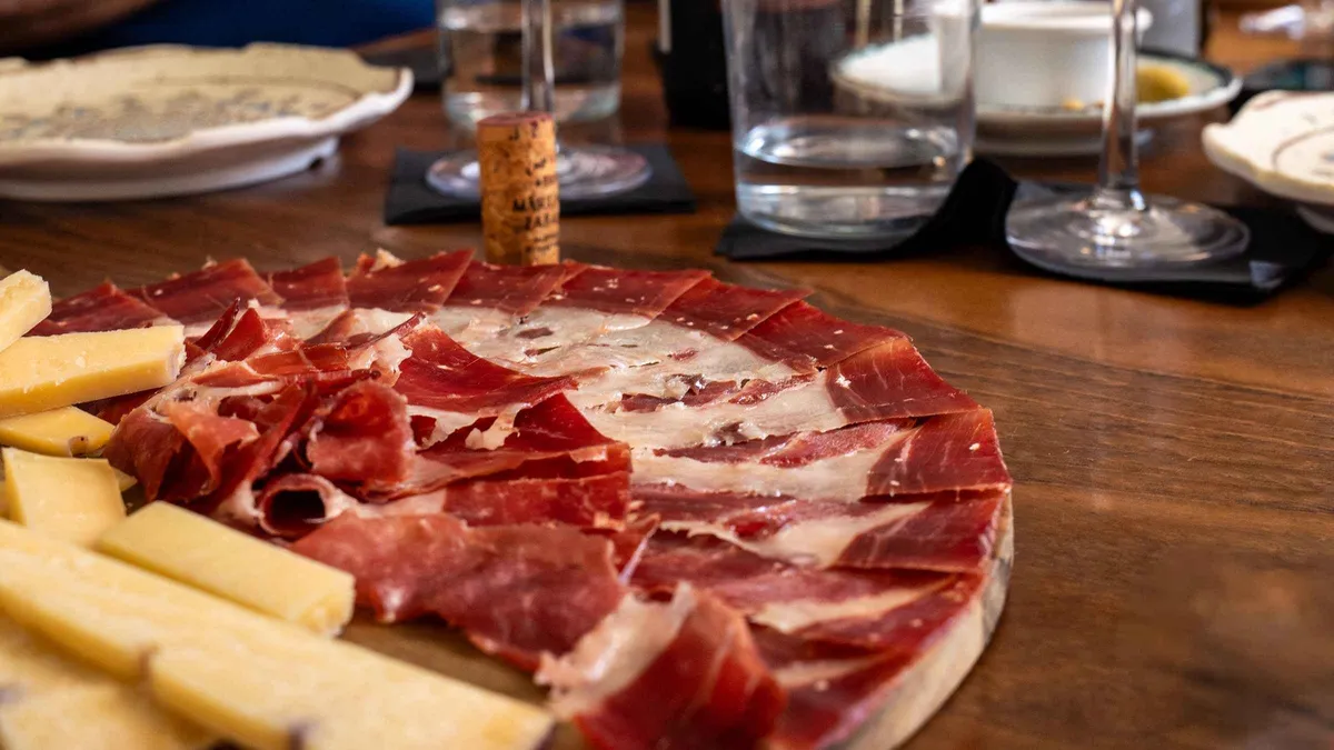 Plates of tapas served on a walking food tour through the old town of Malaga