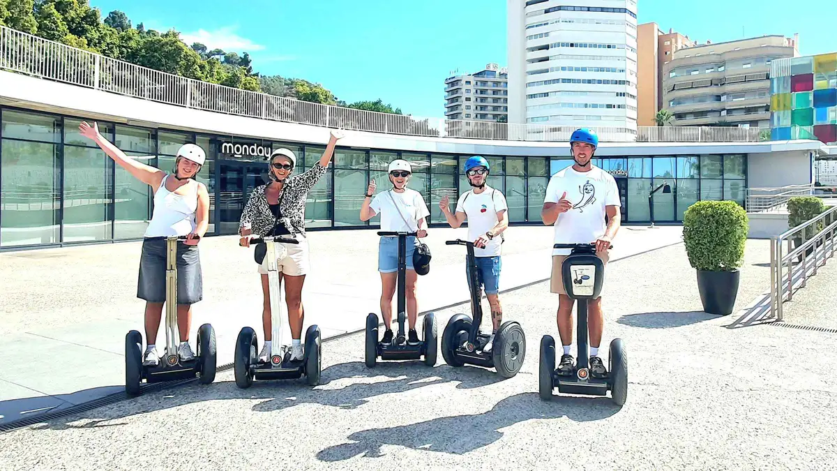 Riders on Segways passing La Malagueta bullring on the way to Gibralfaro, Segway tour of Gibralfaro Castle, port and bullring in Málaga